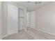 Bedroom featuring a closet with sliding doors for efficient and space-saving storage solutions at 19873 W San Juan Ave, Litchfield Park, AZ 85340