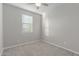 Bedroom featuring a ceiling fan and a window with adjustable blinds at 19873 W San Juan Ave, Litchfield Park, AZ 85340