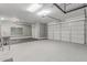 Attached two-car garage with epoxy flooring, storage and plenty of room for parking at 19873 W San Juan Ave, Litchfield Park, AZ 85340