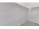 Spacious walk-in closet featuring rod and shelf storage to keep belongings organized at 19873 W San Juan Ave, Litchfield Park, AZ 85340