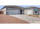 Three car garage and long driveway at 20274 W Monterey Way, Buckeye, AZ 85396