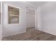 Bright room with durable tile flooring and a window overlooking the yard at 20274 W Monterey Way, Buckeye, AZ 85396