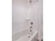 Bright shower with a bathtub, white surround, and simple fixtures at 20274 W Monterey Way, Buckeye, AZ 85396