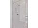 All white shower with rain shower head and built-in niche at 20274 W Monterey Way, Buckeye, AZ 85396