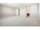 Large carpeted bedroom showing an entrance to an ensuite bathroom at 20473 W Legend Trl, Buckeye, AZ 85396