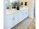 Bright, modern bathroom with double sinks and sleek cabinets, perfect for a refreshing start at 2205 N Peden Dr, Chandler, AZ 85225