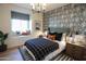 Stylishly decorated bedroom with a window seat, modern lighting, and attractive accents at 2205 N Peden Dr, Chandler, AZ 85225