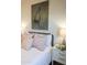 Stylishly decorated bedroom features elegant pillows and artwork creating a cozy and inviting atmosphere at 2205 N Peden Dr, Chandler, AZ 85225