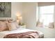 Bright bedroom with a cozy window seat and decorative pillows provides a relaxing retreat at 2205 N Peden Dr, Chandler, AZ 85225