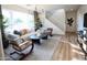 Inviting living room filled with natural light, modern furniture, a stylish rug, and eye-catching decor at 2205 N Peden Dr, Chandler, AZ 85225