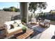 Inviting covered patio features comfortable seating and stylish decor, perfect for outdoor living at 2205 N Peden Dr, Chandler, AZ 85225
