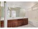 Bathroom featuring double sink vanity with a large mirror and tile flooring at 2308 S Bernard --, Mesa, AZ 85209