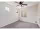 Bright, carpeted bedroom with plantation shutters and recessed lighting at 2308 S Bernard --, Mesa, AZ 85209