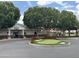 Augusta Ranch Golf Club featuring well-manicured landscaping and inviting clubhouse entrance at 2308 S Bernard --, Mesa, AZ 85209