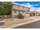 Two-story home exterior with landscaping and a two-car garage at 2308 S Bernard --, Mesa, AZ 85209