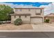 Spacious two-story home featuring an attached two car garage and low maintenance desert landscaping at 2308 S Bernard --, Mesa, AZ 85209