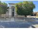 Charming single story home featuring a decorative steel front door and attractive desert landscaping at 2308 S Bernard --, Mesa, AZ 85209
