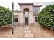 Charming two-story home with neutral tones, arched entry, and manicured landscaping at 2308 S Bernard --, Mesa, AZ 85209