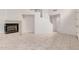 Spacious living room featuring neutral tile floors, fireplace, and access to the staircase at 2308 S Bernard --, Mesa, AZ 85209