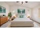 Serene main bedroom with modern decor, vaulted ceilings and calming color palette at 2308 S Bernard --, Mesa, AZ 85209