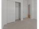 Bedroom with carpet, closet and white trim, perfect for rest and relaxation at 23443 W Albeniz Pl, Buckeye, AZ 85326