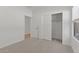 Clean bedroom with carpet and a closet, offering a simple and comfortable space at 23443 W Albeniz Pl, Buckeye, AZ 85326