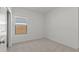 Cozy bedroom with neutral carpet and natural light from a window at 23443 W Albeniz Pl, Buckeye, AZ 85326