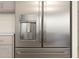 Close up view of the stainless steel refrigerator with water and ice dispenser in a modern kitchen at 23443 W Albeniz Pl, Buckeye, AZ 85326
