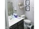 Cozy bathroom with a vanity, toilet, and shower/tub combo at 25028 W Wayland Dr, Buckeye, AZ 85326