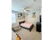 bedroom featuring a ceiling fan, playful decor, and a cozy bed at 25028 W Wayland Dr, Buckeye, AZ 85326