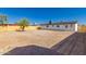 Spacious backyard featuring new fence and exterior access to the home at 2540 E Hartford Ave, Phoenix, AZ 85032