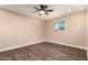 Bedroom featuring wood-look floors, recessed lighting, and a ceiling fan at 2540 E Hartford Ave, Phoenix, AZ 85032