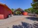 Barn exterior with gravel drive and mature trees at 25829 S Mandarin Dr, Queen Creek, AZ 85142