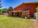 Exterior view of the chicken coop and barn featuring a grassy area at 25829 S Mandarin Dr, Queen Creek, AZ 85142