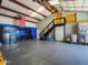 Interior view of garage, featuring epoxy flooring, overhead storage and ample cabinet space at 25829 S Mandarin Dr, Queen Creek, AZ 85142