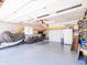 Spacious garage with painted floor and walls, organized storage, and ample room for vehicles and projects at 25829 S Mandarin Dr, Queen Creek, AZ 85142