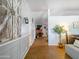 Hallway with modern accents including barn door, leading to a living area with fireplace at 25829 S Mandarin Dr, Queen Creek, AZ 85142