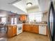 Functional kitchen area with stainless steel appliances and tile backsplash at 25829 S Mandarin Dr, Queen Creek, AZ 85142