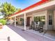 Charming covered patio with comfortable seating and a cozy atmosphere at 25829 S Mandarin Dr, Queen Creek, AZ 85142