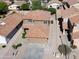 Aerial view of a two-story home with a tile roof and well-maintained landscaping at 272 S 228Th Ln, Buckeye, AZ 85326