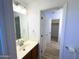 Bathroom featuring a walk-in closet at 272 S 228Th Ln, Buckeye, AZ 85326