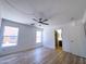 Spacious bedroom with natural light and wood-look floors at 272 S 228Th Ln, Buckeye, AZ 85326