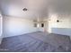 Spacious carpeted bonus room with views of multiple rooms at 272 S 228Th Ln, Buckeye, AZ 85326