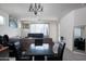 An inviting dining area featuring a table and chairs, perfect for Gathering meals and gatherings at 2723 W Apollo Rd, Phoenix, AZ 85041