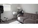A cozy living room has a couch, printer, and speaker, perfect for relaxation and entertainment at 2723 W Apollo Rd, Phoenix, AZ 85041