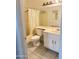 Bathroom featuring a shower/tub combo, toilet, and white vanity with storage at 2937 E Garnet Cir, Mesa, AZ 85204