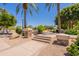 Inviting park entrance with stone accents, steps, mature trees, and manicured landscaping at 3581 W Ironwood Dr, Chandler, AZ 85226