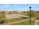 Community basketball court with well-kept green spaces, offering a recreational amenity for residents at 3929 E Bloomfield Pkwy, Gilbert, AZ 85296