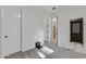 Neutral bedroom featuring a closet door and automated vacuum at 3929 E Bloomfield Pkwy, Gilbert, AZ 85296