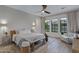 Bedroom featuring neutral tones, a ceiling fan, and plenty of natural light at 3929 E Bloomfield Pkwy, Gilbert, AZ 85296